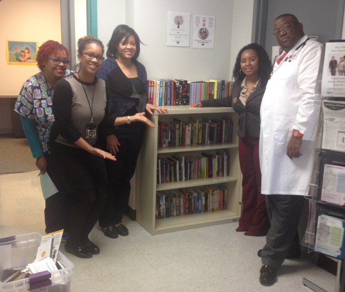 The staff at the Healthy Teen Center with the RX for Reading Library!