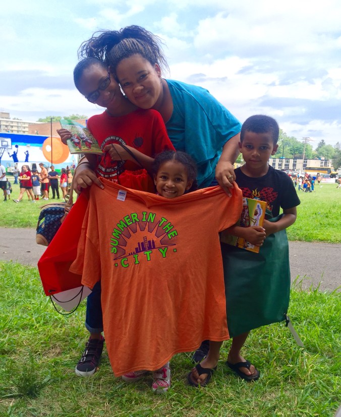 The little boy pictured here with his sisters and mother said as they started to walk away, "Mama, can I go back and sit in the van because I want to read my book?!"