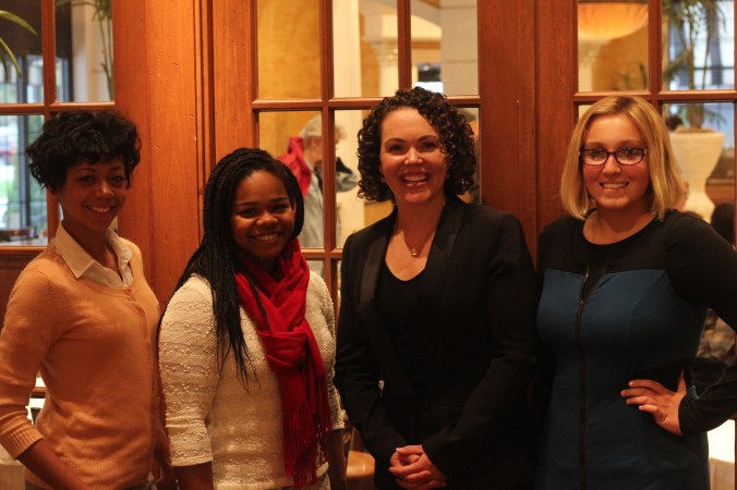 Rx for Reading volunteers Renesha Smoot Grafton, Maya Faison, and Emily Auten with Dr. Harrison.